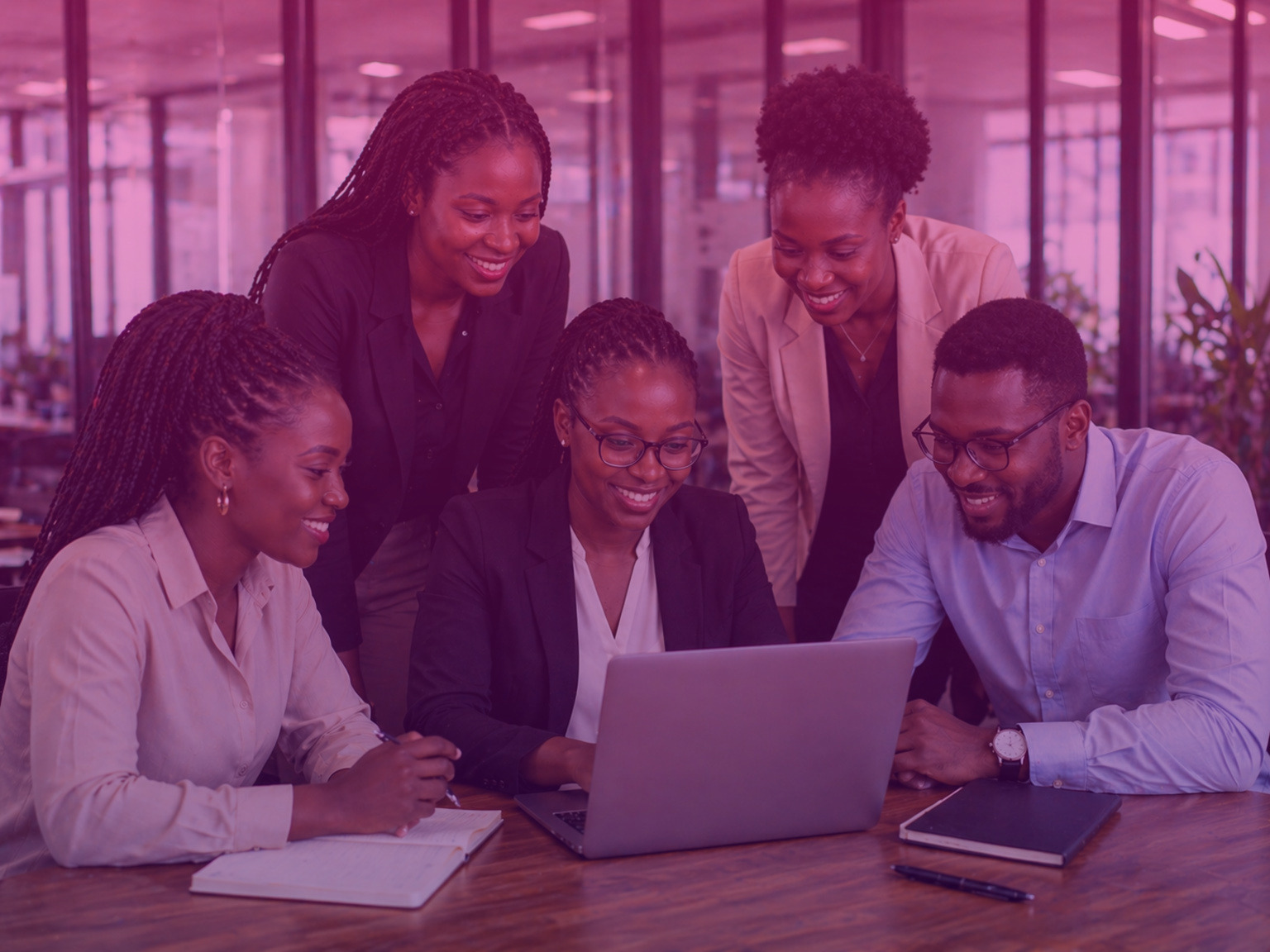 WiCyS Uganda community members collaborating